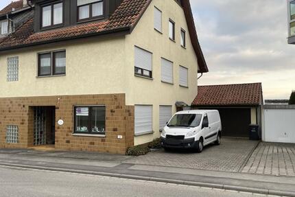 Hausanteil mit Wohnung und Gewerberaum