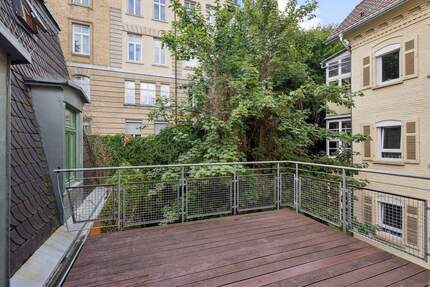 2-Zimmer-Wohnung mit großer Dachterrasse mitten in der Stadt 2 zimmer