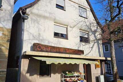 Mehrfamilienhaus mit zwei Wohnungen und Laden 6 zimmer