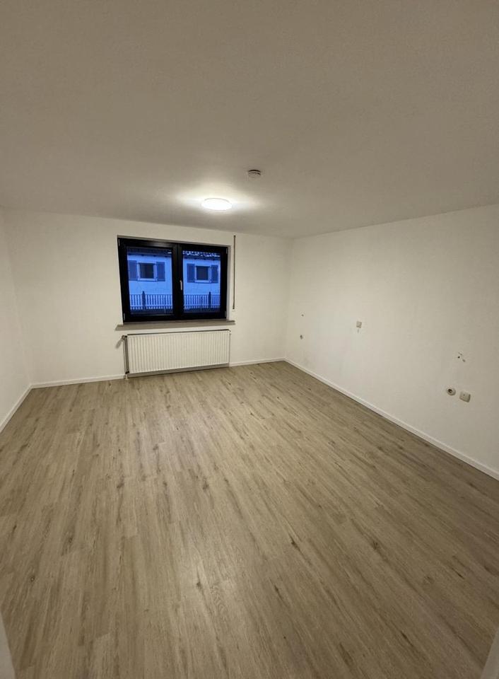 Einfamilienhaus mit Garten und Garage