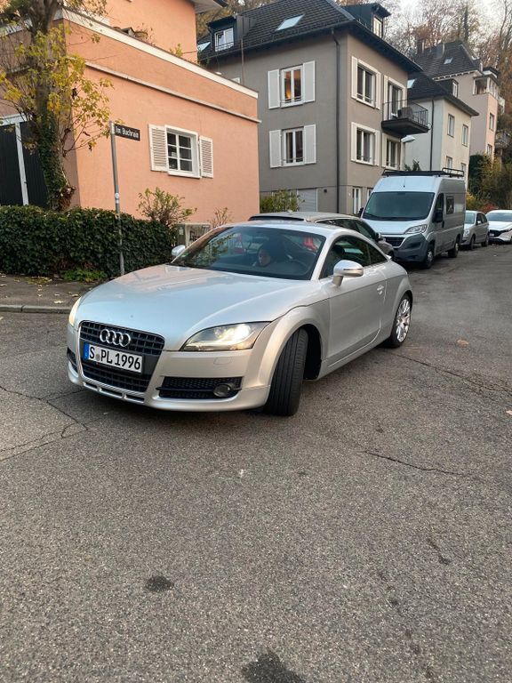 TT