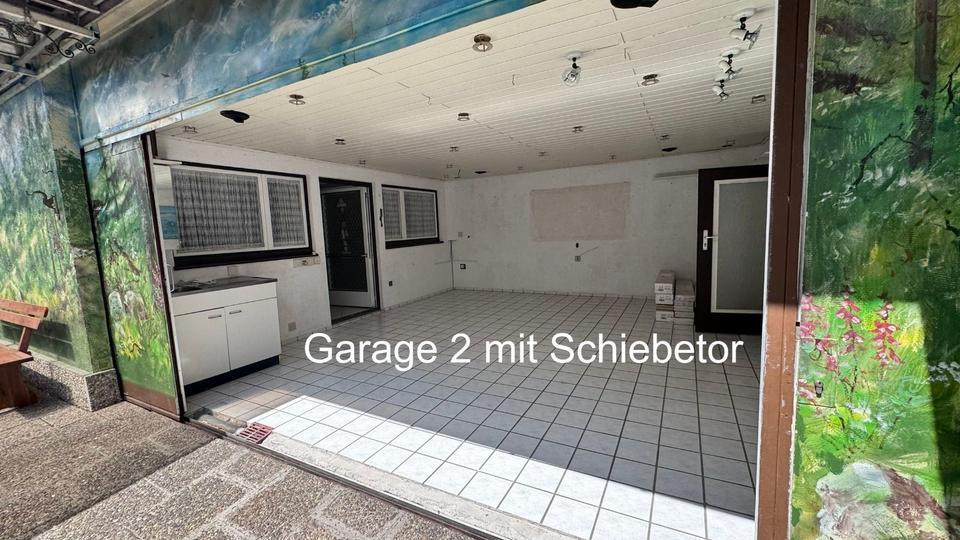1-2 Familienhaus mit 2 Garagen, Werkstatt und viel Platz