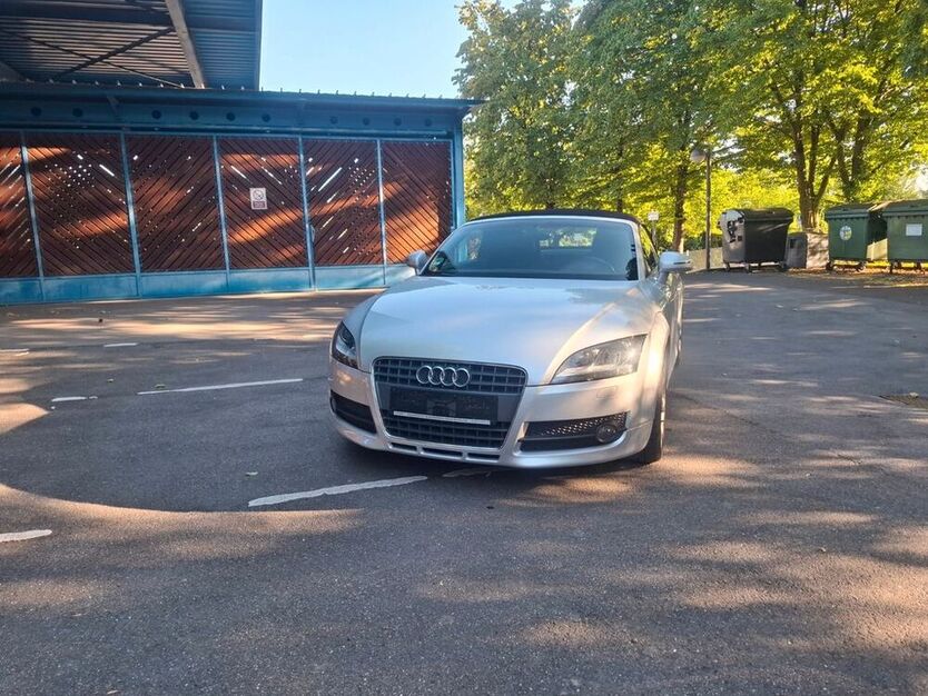 TT