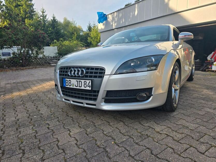 TT